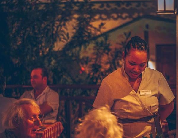 Bequia Beach Hotel - Bagatelle Staff Serving Drinks